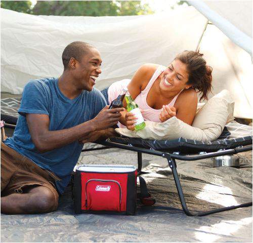 Coleman ComfortSmart Deluxe Cot in a tent - a lot of storage space underneath the cot. 