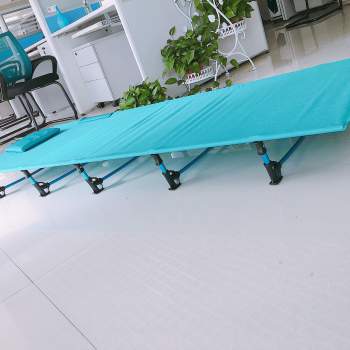 The cot can be used in the office.