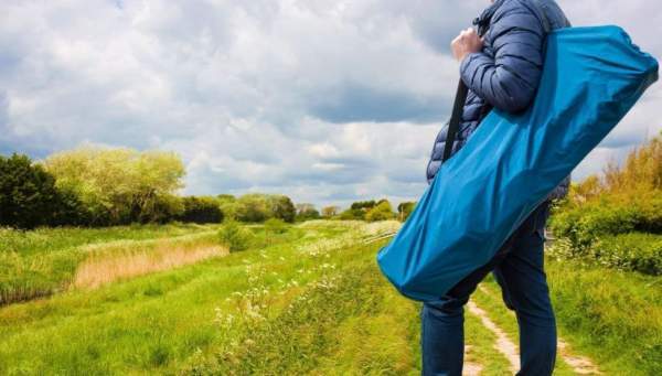 The carry bag is large and with straps.