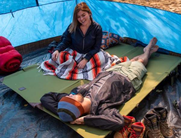 Two Kijaro cots attached to each other.